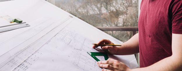 Architect Planning Acoustic Building Performance Architect in Melbourne reviewing building plans with acoustic zoning and soundproofing strategies for residential and commercial projects