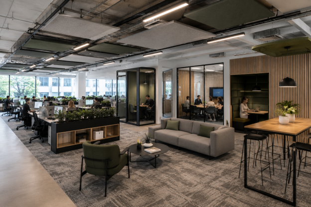 Contemporary office interior featuring modular meeting rooms, flexible workstations, acoustic treatments and sustainable workplace design.