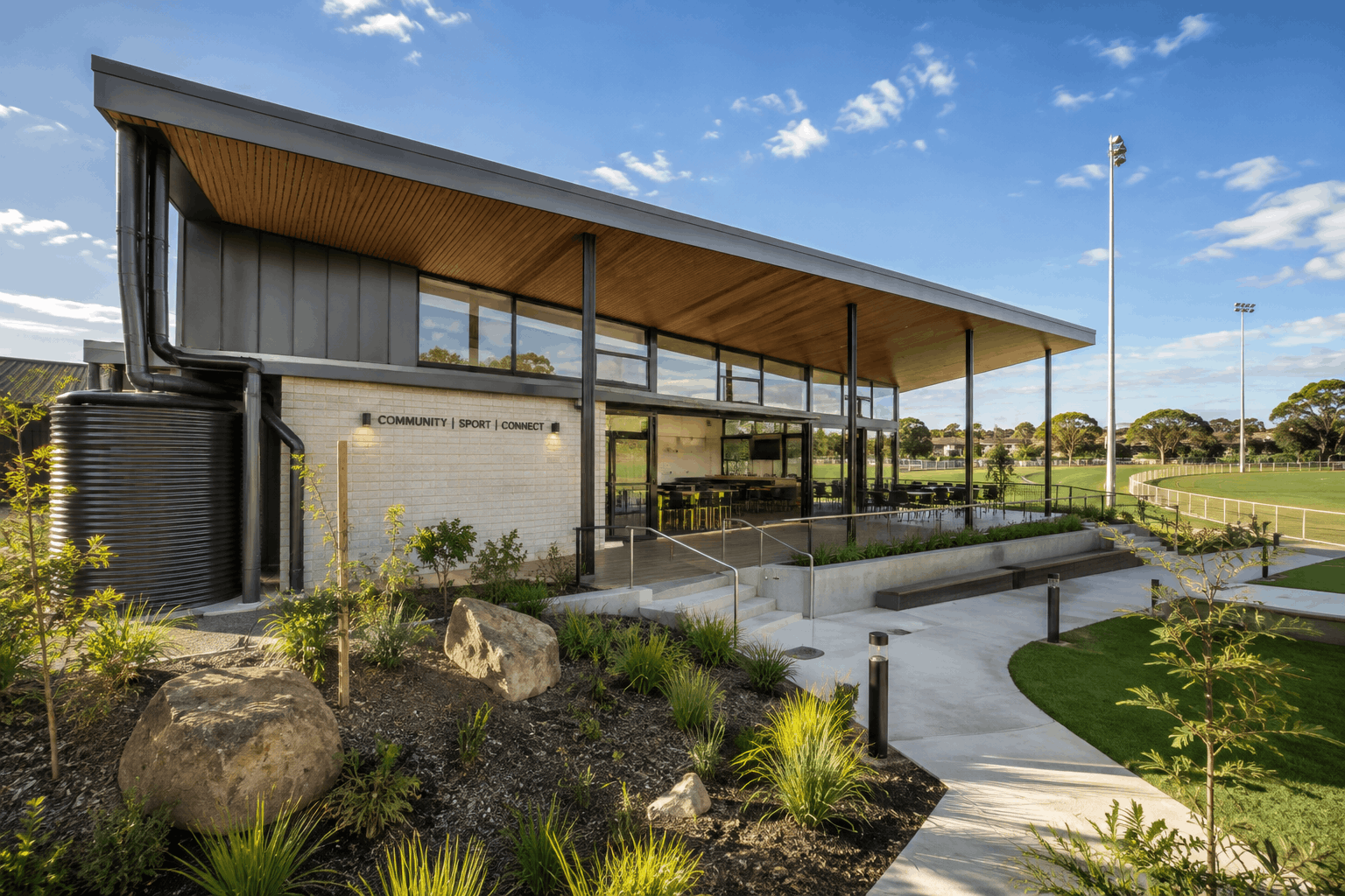 Modern multi-sport pavilion designed by Melbourne sports facility architects with flexible community spaces